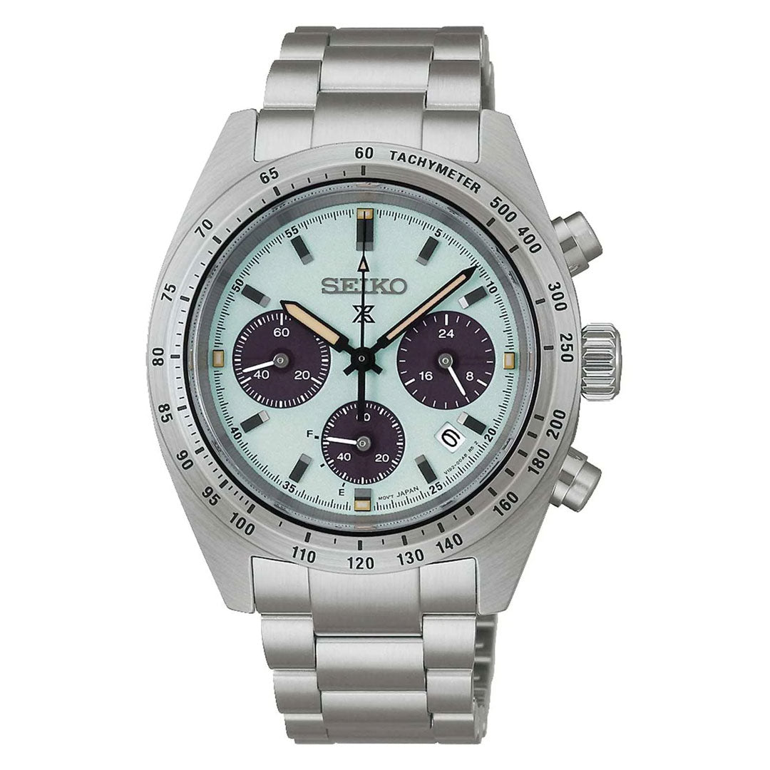 The Seiko Prospex Speedtimer Solar Chronograph 39mm features a stainless steel band, light blue dial with three black subdials, tachymeter bezel, and has two pushers and a crown on the right.
