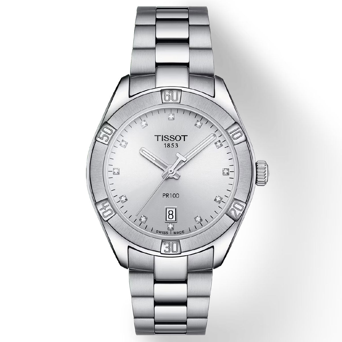 The Tissot PR 100 Sport Chic Quartz 36mm Watch features a sporty design with a silver stainless steel band and bezel. It boasts a silver dial equipped with Swiss Quartz Movement, sleek hour markers, and hands. The date display is positioned at 6 o'clock, with "Tissot 1853" inscribed on the upper part of the dial, all protected by scratch-resistant sapphire crystal.