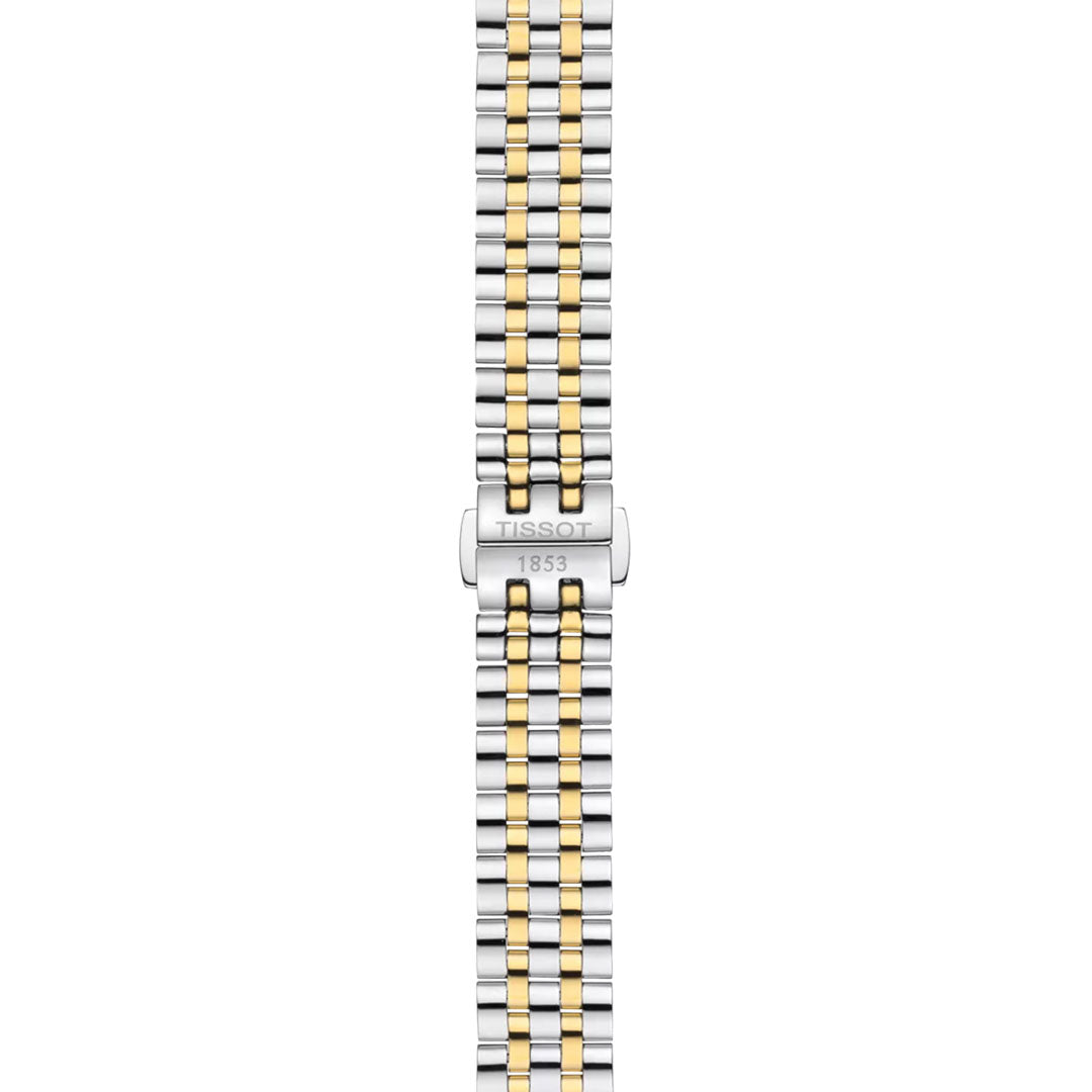 A close-up of the Tissot Carson Premium Quartz 30mm Watch highlights its stainless steel bracelet with alternating gold-tone links and "TISSOT 1853" engraved on the central clasp.