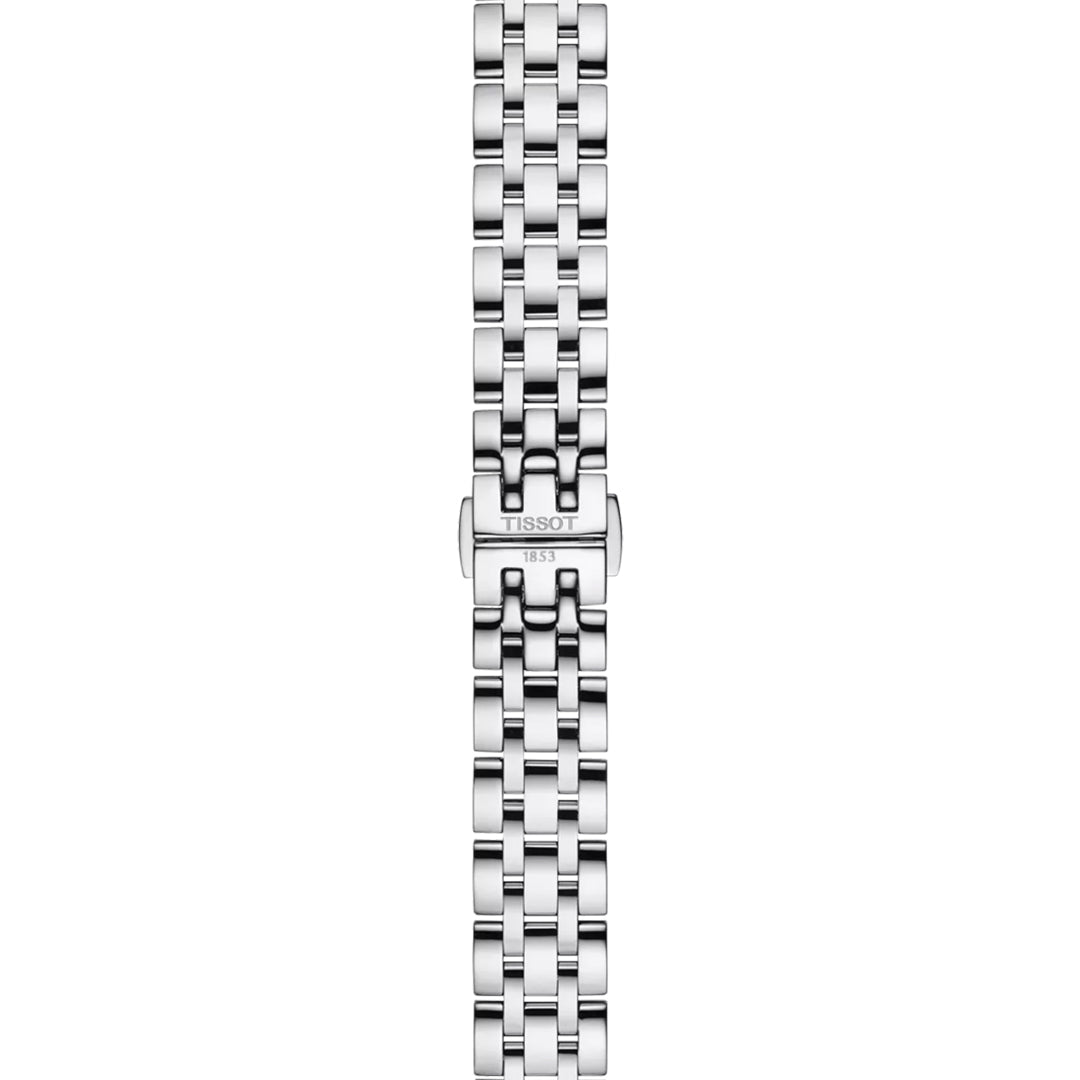 The Tissot Classic Dream Lady Quartz 28mm Watch showcases a polished, linked silver bracelet that exudes sophistication. The clasp is engraved with "Tissot" and the year "1853," underscoring its legacy in classic timepieces. This watch boasts a sleek and elegant appearance.