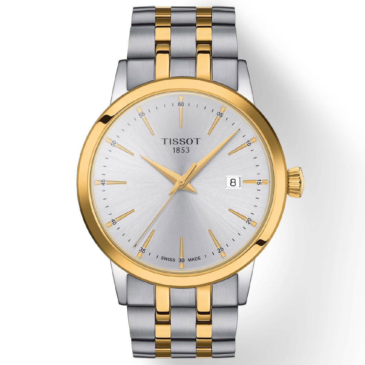 The Tissot Classic Dream Quartz 42mm Watch by Tissot features a silver face with gold hour markers, a date display, and a two-tone silver and gold metal bracelet. It is equipped with scratch-resistant sapphire crystal for durability and precise Swiss Quartz Movement for accurate timekeeping.