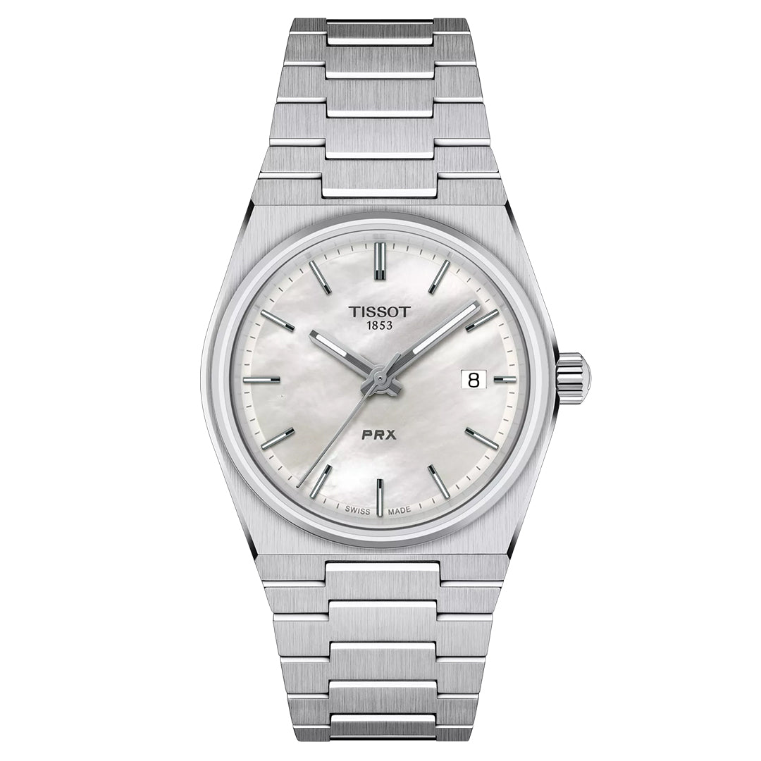 The Tissot PRX Quartz 35mm Watch features a stainless steel band, a white dial with silver hour markers and date window at 3 o’clock, Swiss Quartz movement, and the “Tissot 1853” branding below 12 o’clock.