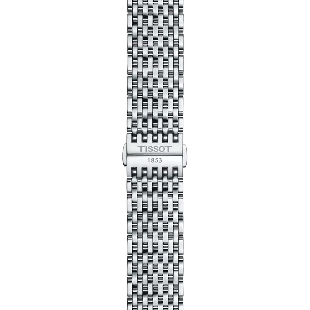A close-up of the Tissot Everytime Quartz 40mm Watch’s stainless steel bracelet shows interlocking links and a clasp engraved with "TISSOT 1853," reflecting the classic elegance of this Swiss-made timepiece.