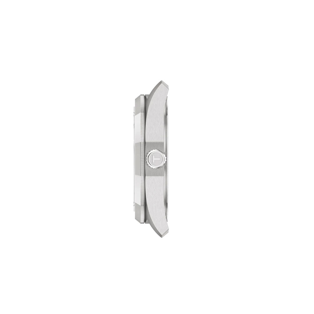 Side view of the Tissot PRC 100 Solar Quartz 34mm Watch in silver, showing the central crown with a shield-shaped logo, set against a plain white background. This Tissot timepiece combines elegance with solar-powered innovation.