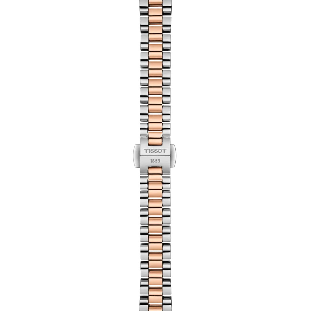 A two-tone Tissot metal watch band features alternating silver and rose gold links, displayed from an overhead perspective. The clasp is engraved with “TISSOT 1853,” enhancing the elegance of this sophisticated design—perfectly complementing the Tissot Desir Moonphase Quartz 29.6mm Watch with its refined stainless-steel bracelet.