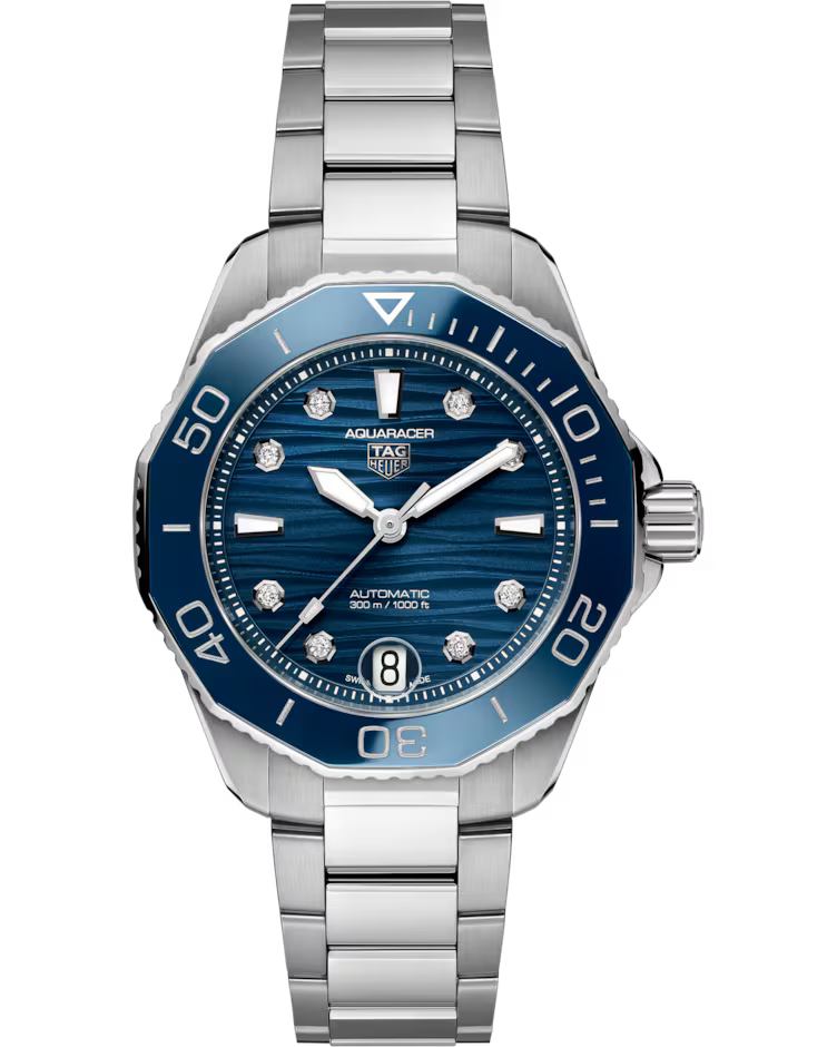A TAG Heuer Aquaracer Professional 300 Date Automatic 36mm watch featuring a blue dial with diamond hour markers, a date window at 6 o’clock, and a stainless steel bracelet.