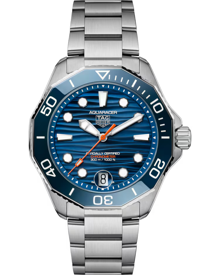 The TAG Heuer Aquaracer Professional 300 Date Automatic 42mm Watch by TAG Heuer features a blue patterned dial, silver hour markers, a date display at 6 o’clock, and a stainless steel bracelet. Its bezel is accented with bold white numerals.