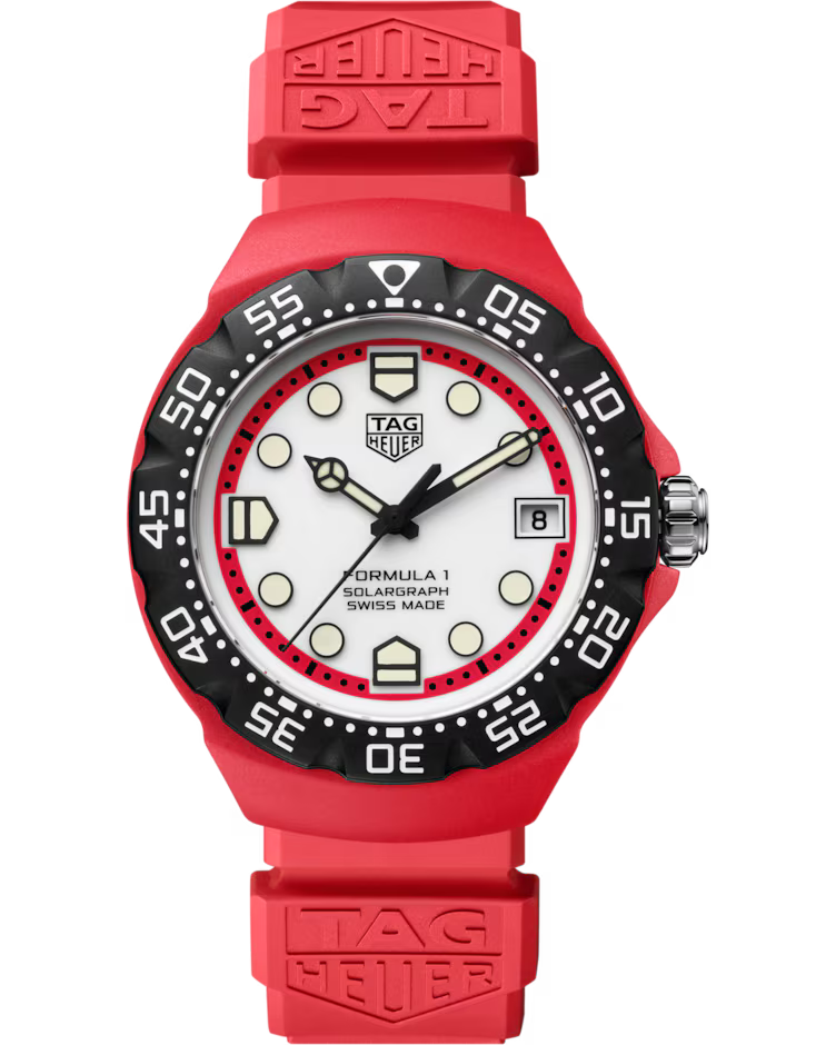 The TAG Heuer Formula 1 Solargraph Solar Quartz 38mm Watch features a red rubber strap, black bezel, and white dial with bold markers and a date window at 3 o’clock. The face displays the “TAG Heuer” logo and “Swiss Made” inscription.