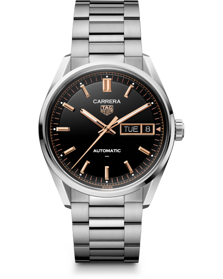 The TAG Heuer Carrera Day-Date Automatic 41mm Watch features a sleek black dial accented by rose gold hour markers and hands, a day-date window, and comes with a stainless steel bracelet.