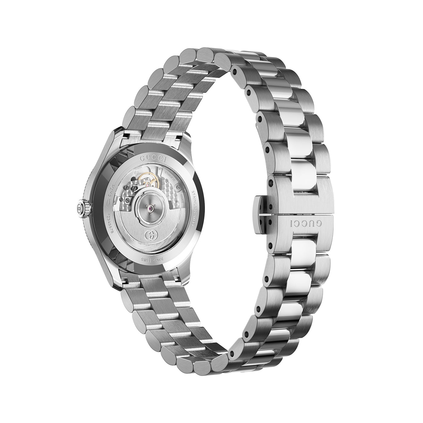 The Gucci G-Timeless Automatic 40mm Watch from the GUCCI Watch brand showcases a stainless steel construction with a transparent back, revealing its mechanical movement. Its steel bracelet is crafted with both polished and brushed finishes, and features an elegant "GUCCI" engraving on the clasp. The timepiece is positioned at a three-quarter angle.