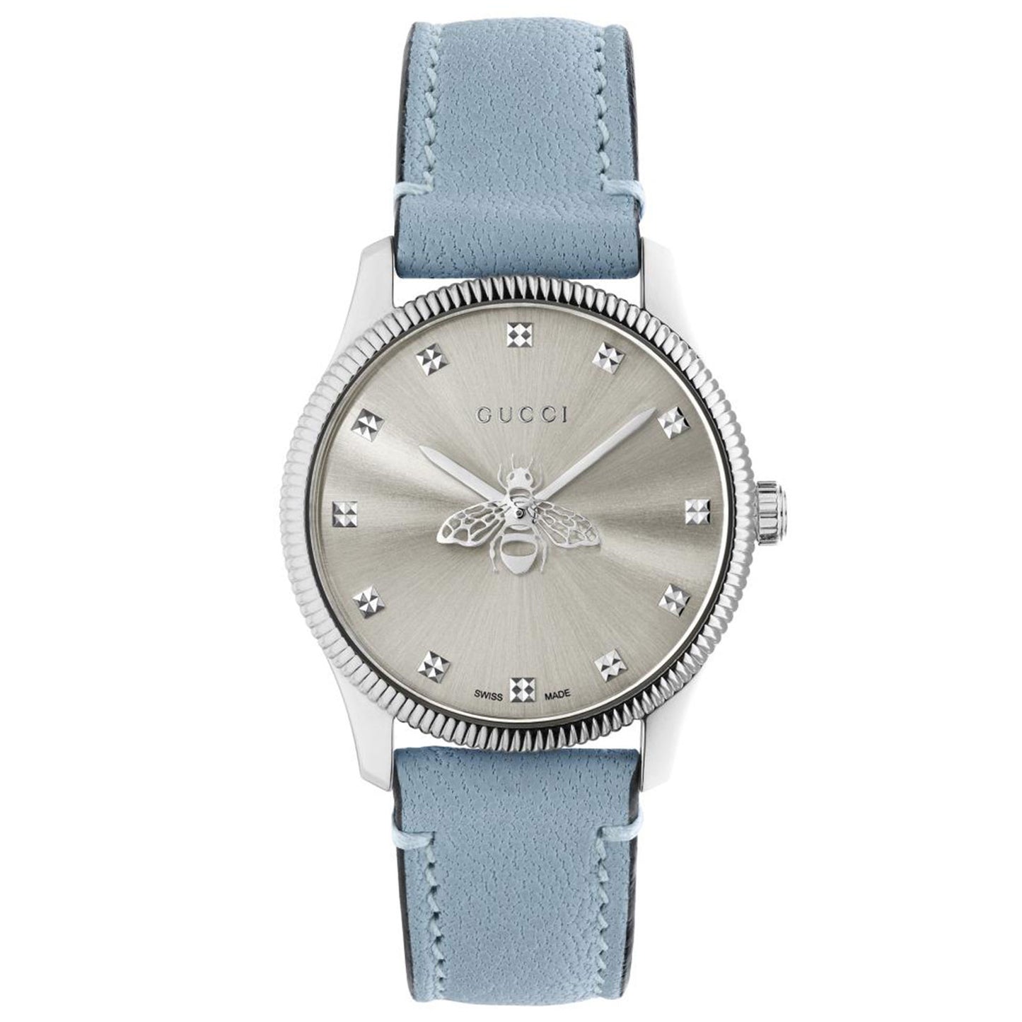The Gucci G-Timeless with Bees Quartz 39mm Watch exhibits a silver-tone face embellished with an intricate bee detail at its center and features diamond-like hour markers, a light blue leather strap, and a ridged bezel.