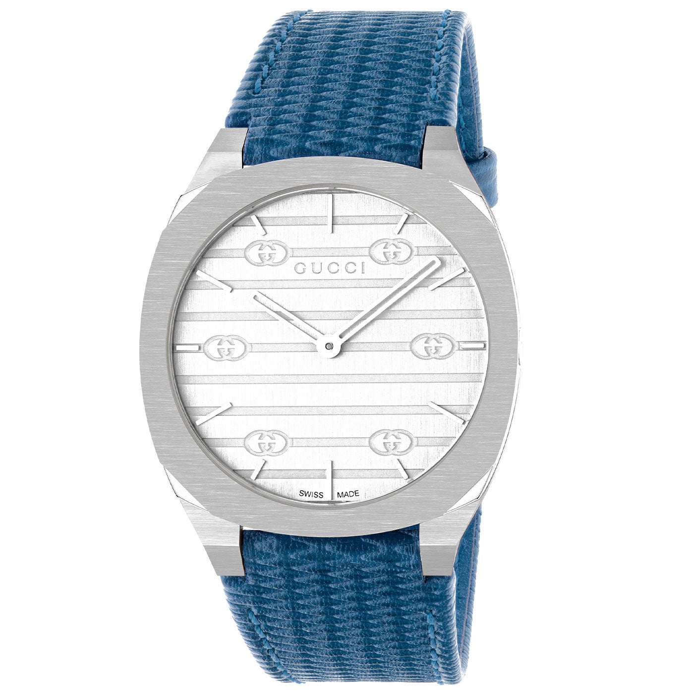 Explore the exquisite GUCCI Watch's Gucci 25H Quartz 34mm, featuring a chic silver oval face with delicate horizontal engravings and the signature Gucci emblem. Its silver-toned case is beautifully complemented by a textured blue fabric strap, delivering a minimalist and contemporary look.