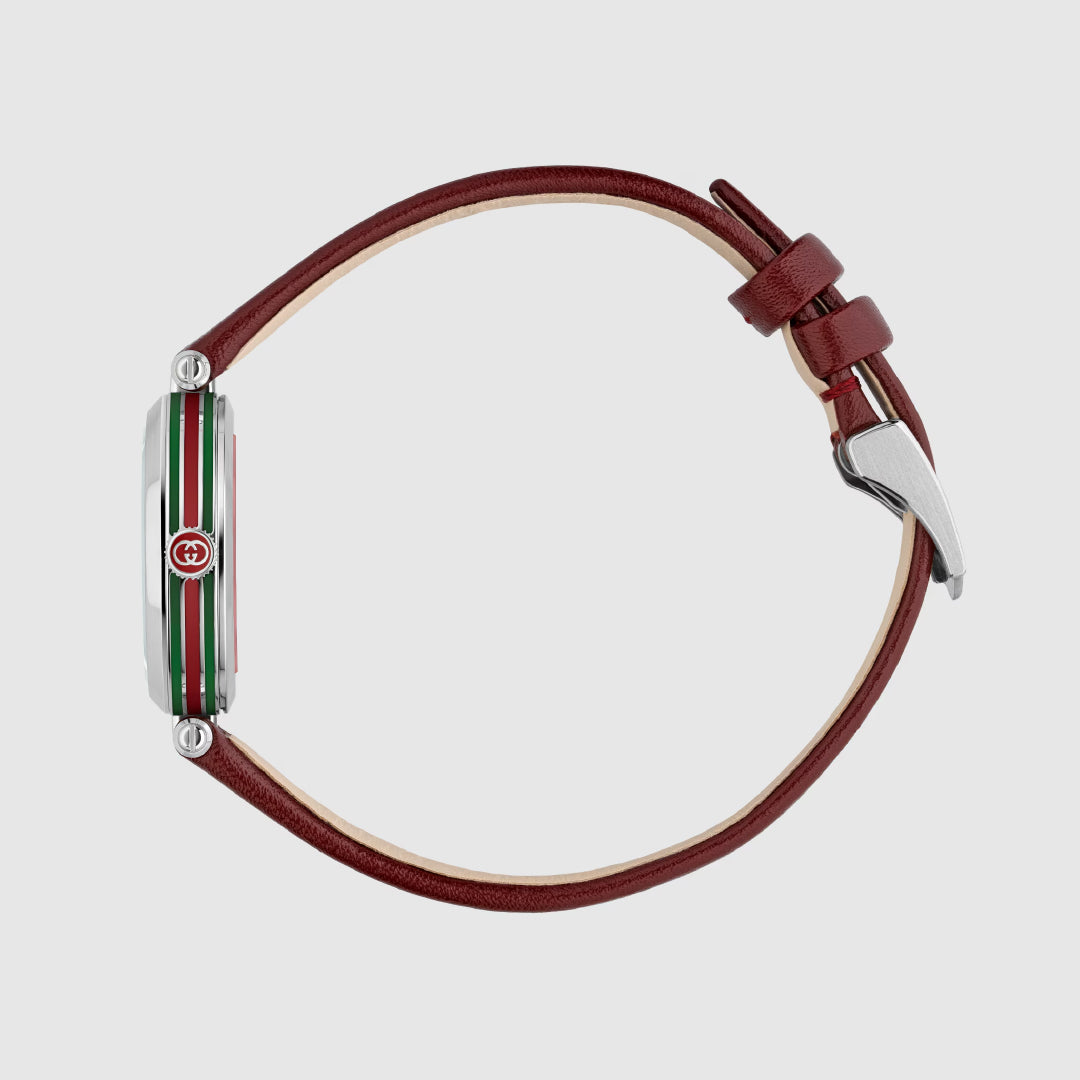 Side view of a Gucci Model 2000 Quartz 24mm Watch from GUCCI, featuring a brown leather strap with silver buckle. The silver case showcases red and green stripes and Swiss craftsmanship against a light gray background.