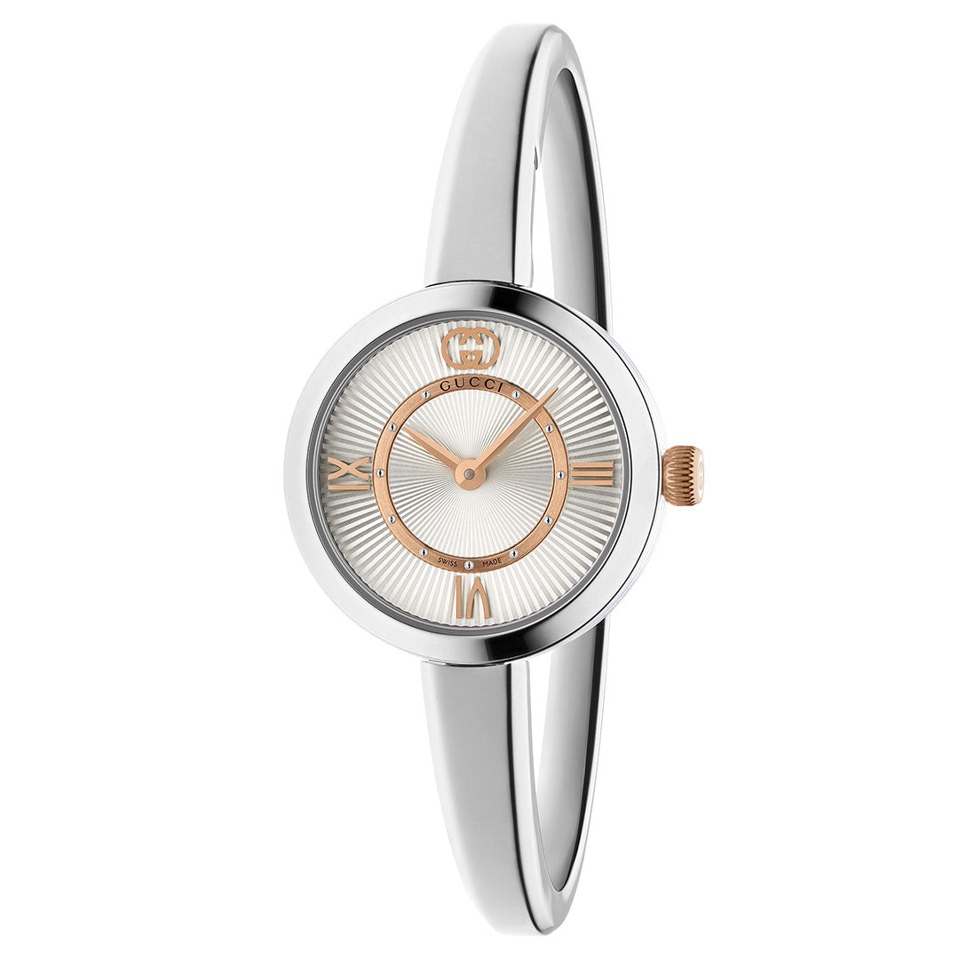 The Gucci Model 2000 Quartz 24mm Watch features a round silver stainless steel case, rose gold-tone accents, a white textured dial, sapphire glass, and a slim silver bangle-style bracelet for women.