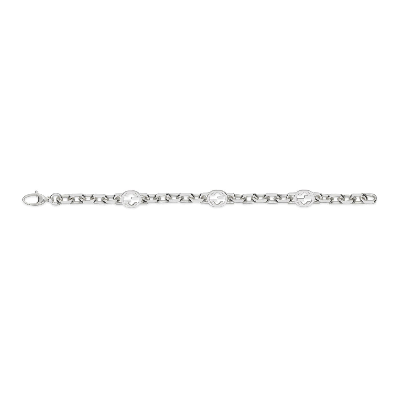 The Gucci Interlocking G Sterling Silver Chain Bracelet from GUCCI Fine Jewellery highlights a bold chain design with three circular relief disk elements spaced evenly along its length, featuring the iconic interlocking G motifs and a clasp for secure fastening.