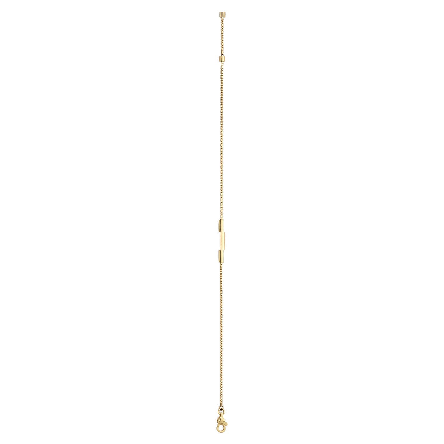 The Gucci Link to Love 18K Yellow Gold Chain Bracelet With "Gucci" Bar from GUCCI Fine Jewellery is a sophisticated piece, featuring an adjustable length with a lobster clasp and a small cylindrical "Gucci" bar as its elegant centerpiece.