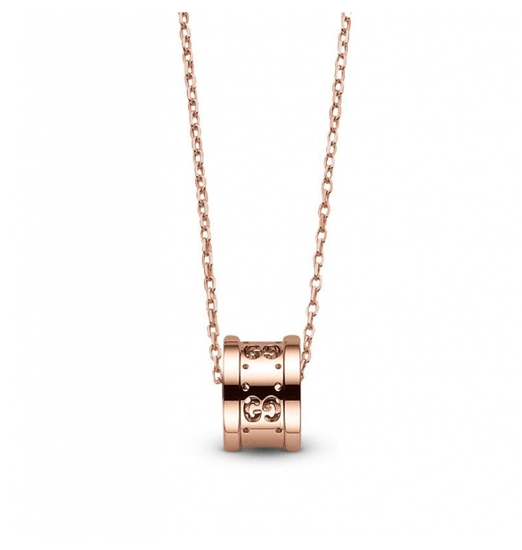 The GUCCI Fine Jewellery Gucci Icon Twirl 18K Rose Gold Chain Necklace Pendant showcases a beautiful 16.5-inch chain and a cylindrical pendant adorned with intricate cut-out designs, capturing the elegance synonymous with the Icon Twirl collection.