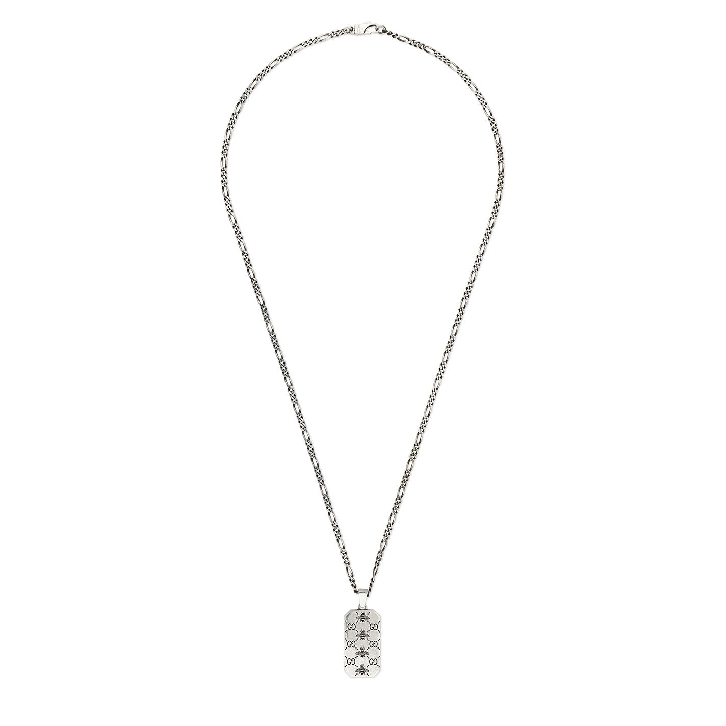 Introducing the Gucci GG and Bee Engraved Sterling Silver Necklace Pendant by GUCCI Fine Jewellery. This elegant accessory features a long chain with a rectangular pendant adorned with an interlocking GG and bee design, offering subtle detailing that adds texture to its sophisticated appearance.