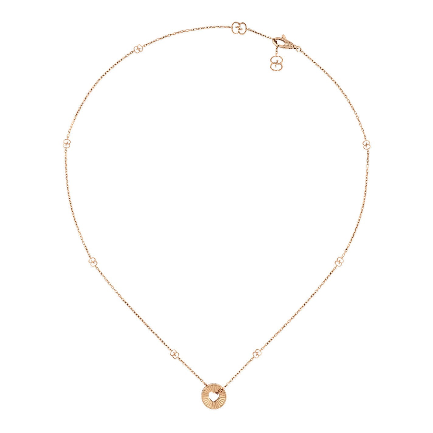 The Gucci Icon Heart 18K Rose Gold Necklace Pendant by GUCCI Fine Jewellery features a delicate circular heart design with a small heart cutout in the center, seamlessly connected by a fine chain decorated with evenly spaced decorative links.