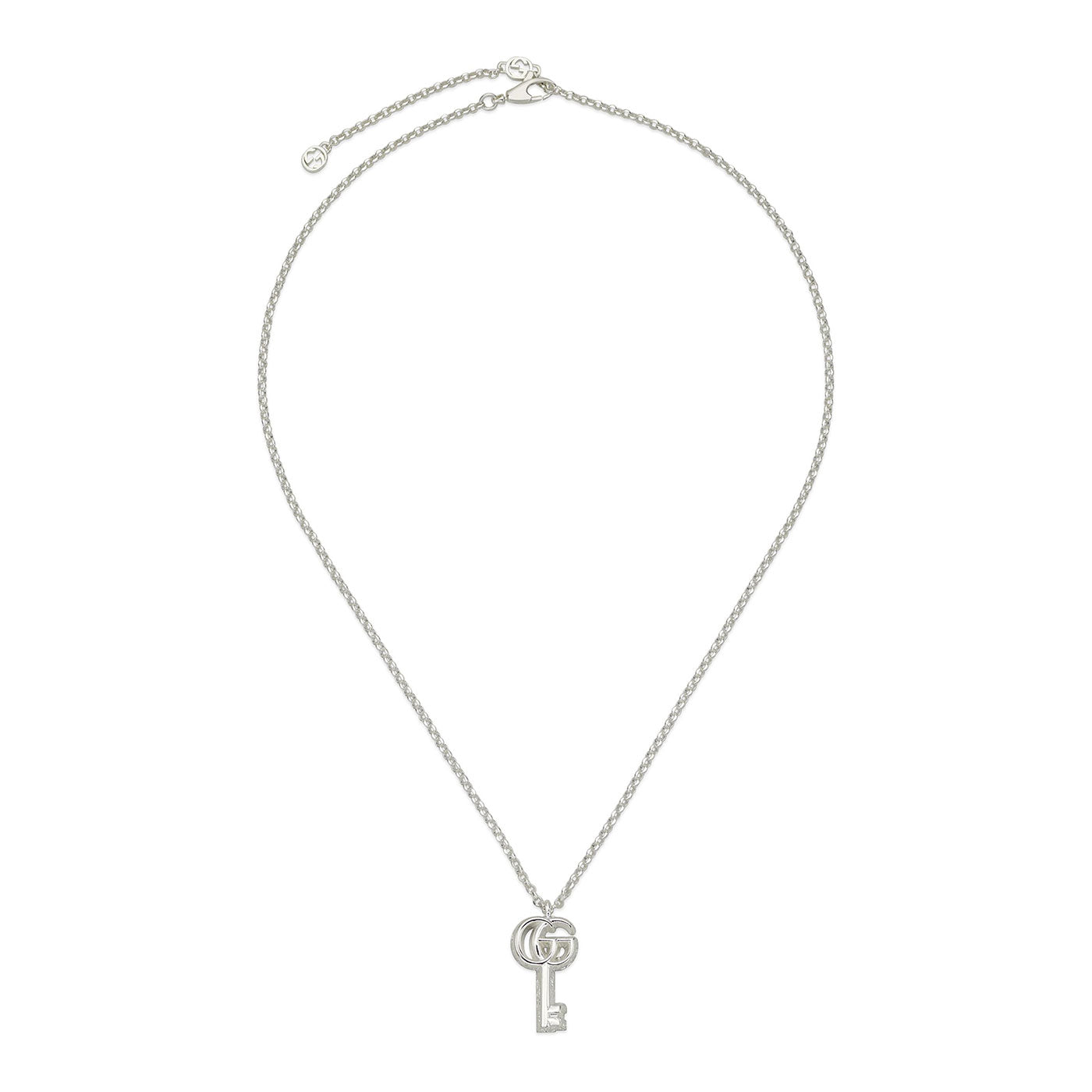 The Gucci GG Marmont Key Charm Sterling Silver Necklace Pendant from GUCCI Fine Jewellery features a delicate key-shaped pendant elegantly centered on its thin, adjustable chain, embodying simplicity and sophistication in true Gucci style.