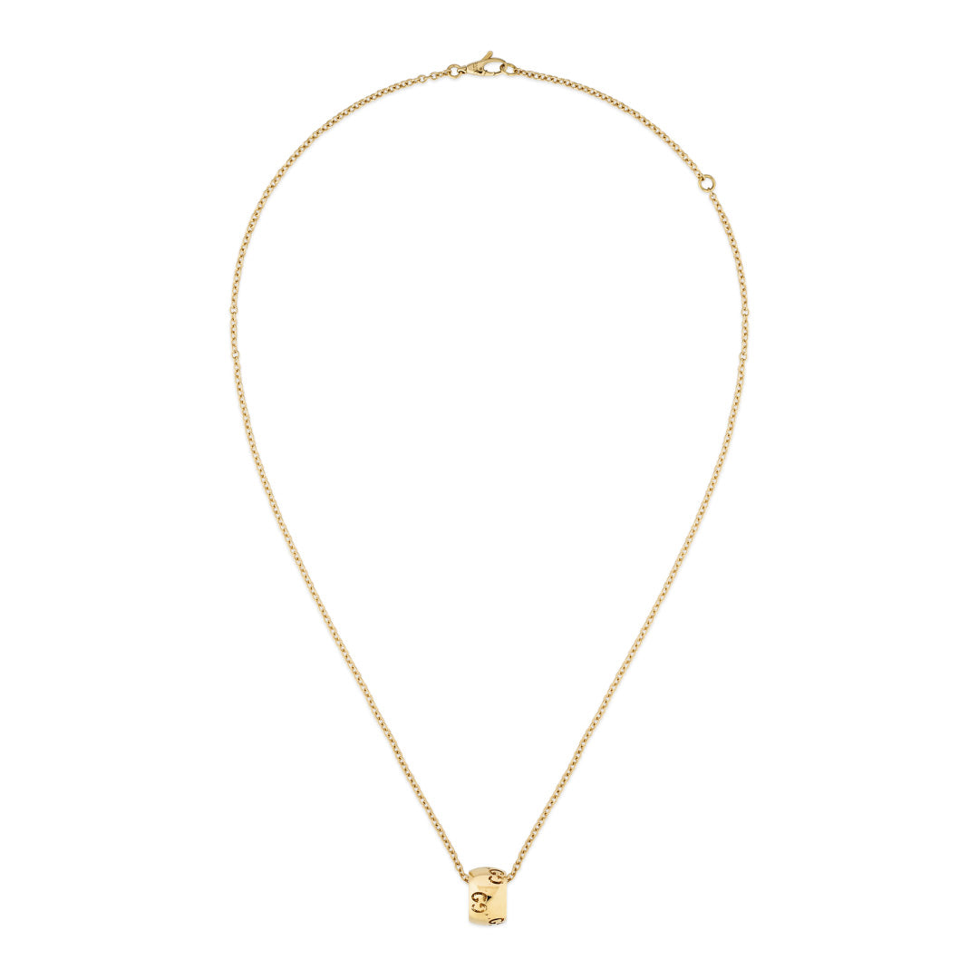 The Gucci Icon GG 18K Yellow Gold Necklace Pendant by GUCCI Fine Jewellery showcases a small, rectangular lock pendant with a delicate keyhole design, exuding minimalist elegance. The subtle GG cut-out motif adds to its charm. This piece is crafted according to Responsible Jewelry Council standards and features a simple clasp for closure.