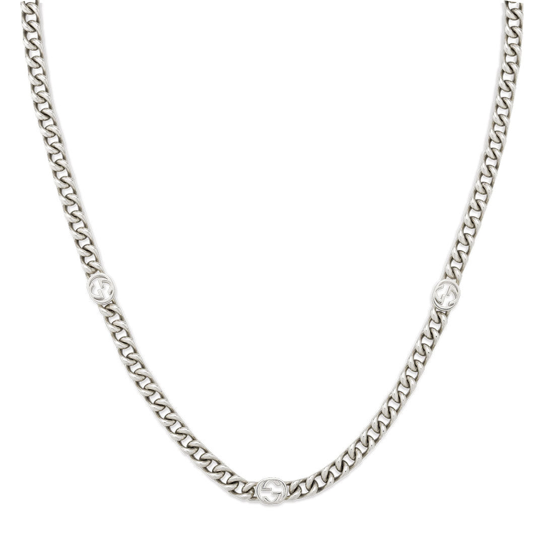 The Gucci Blind For Love Sterling Silver Chain Necklace by GUCCI Fine Jewellery features a curb link design with three round Interlocking G charms, expertly crafted in Italy and displayed against a white background.