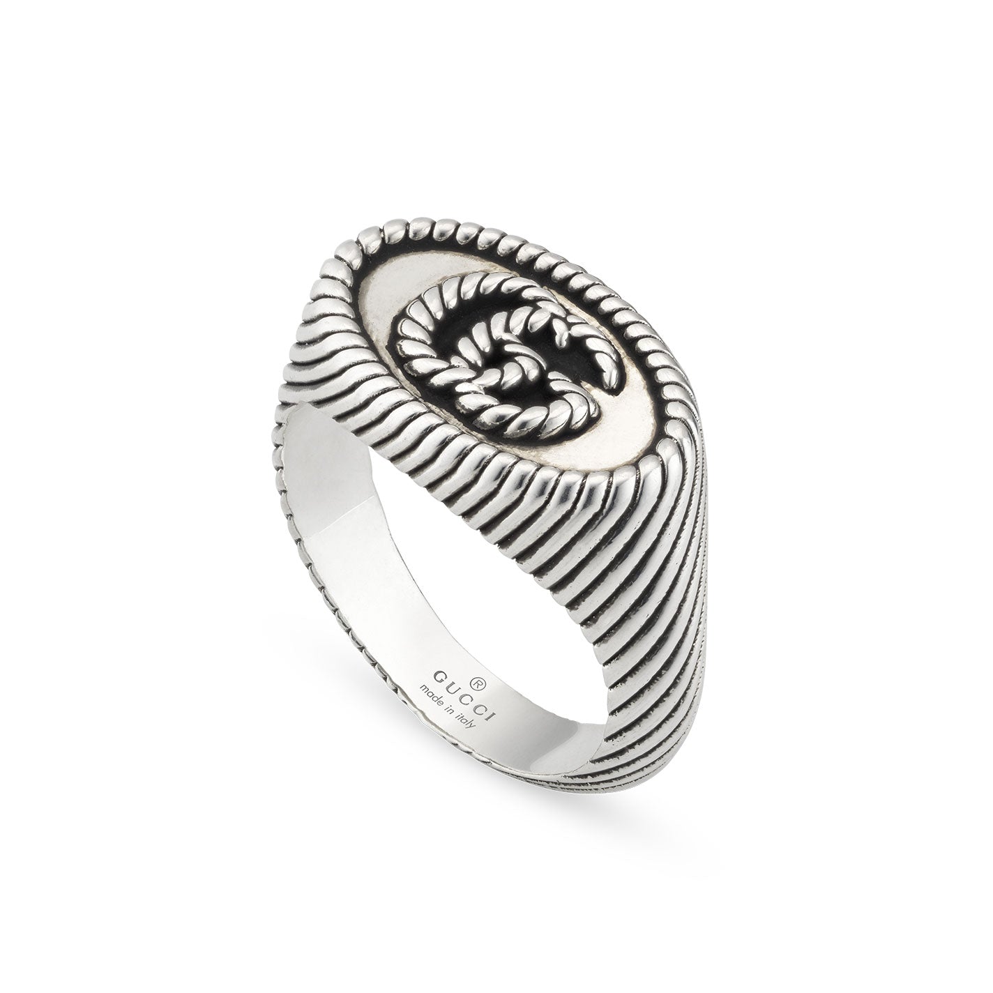 The Gucci Double G Chevalier Aged Sterling Silver Ring from GUCCI Fine Jewellery showcases a textured band with an ornate design resembling a braided pattern or the iconic Gucci Double G logo, exuding a sophisticated and stylish appearance.