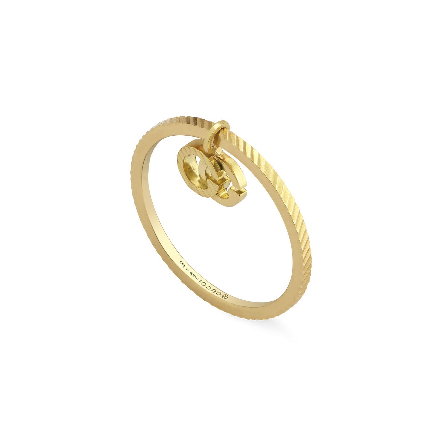 The Gucci Running G 18K White Gold Ring by GUCCI Fine Jewellery is a sleek and elegantly designed ring with a thin, textured band, featuring a small, dangling gold lock charm.