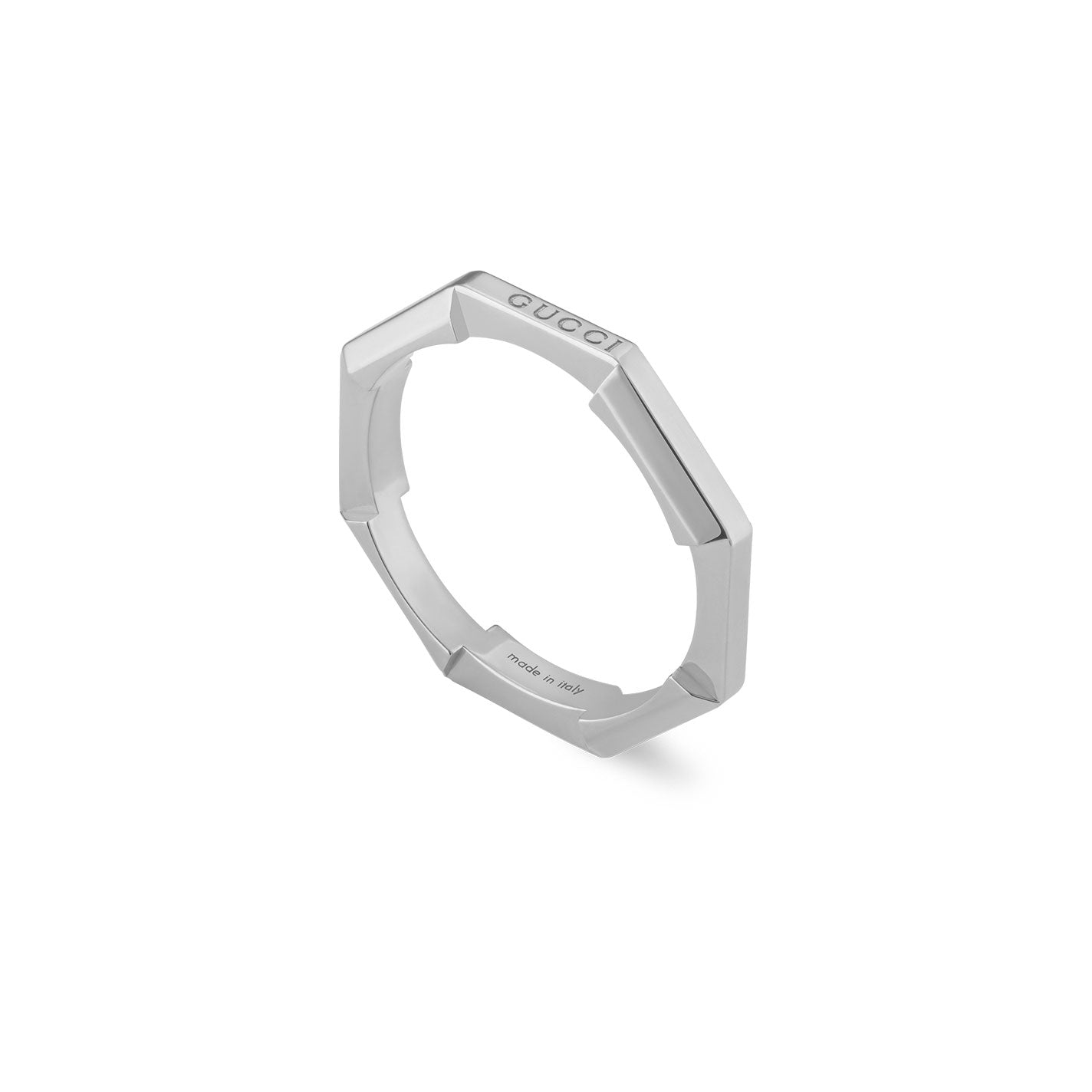 The Gucci Link to Love Mirrored 18K White Gold Ring is a sleek, silver hexagonal piece crafted from 18k white gold with beveled edges. The name "Gucci" adorns the top, while "made in Italy" is inscribed inside. Its minimalist design from GUCCI Fine Jewellery adds a modern touch to any ensemble.