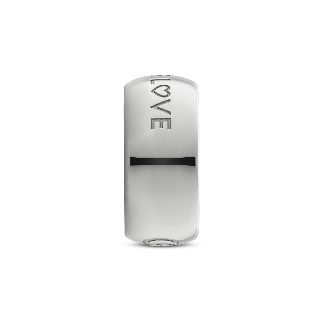 The Gucci Blind For Love 9mm Sterling Silver Ring by GUCCI Fine Jewellery features "LOVE" engraved vertically with a heart-shaped "O," echoing the iconic Blind For Love motif. Displayed on a plain white background.