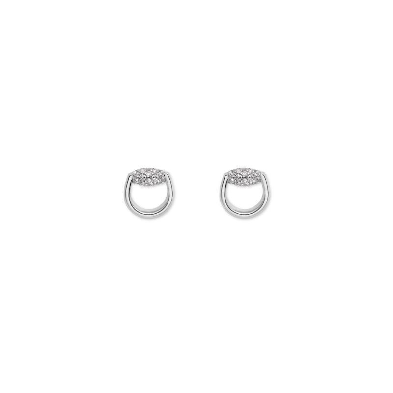 The Gucci Horsebit 18K White Gold Diamond Stud Earrings from GUCCI Fine Jewellery are small, silver hoop earrings that showcase a cluster of tiny sparkling diamonds at the top, set against a plain white background.