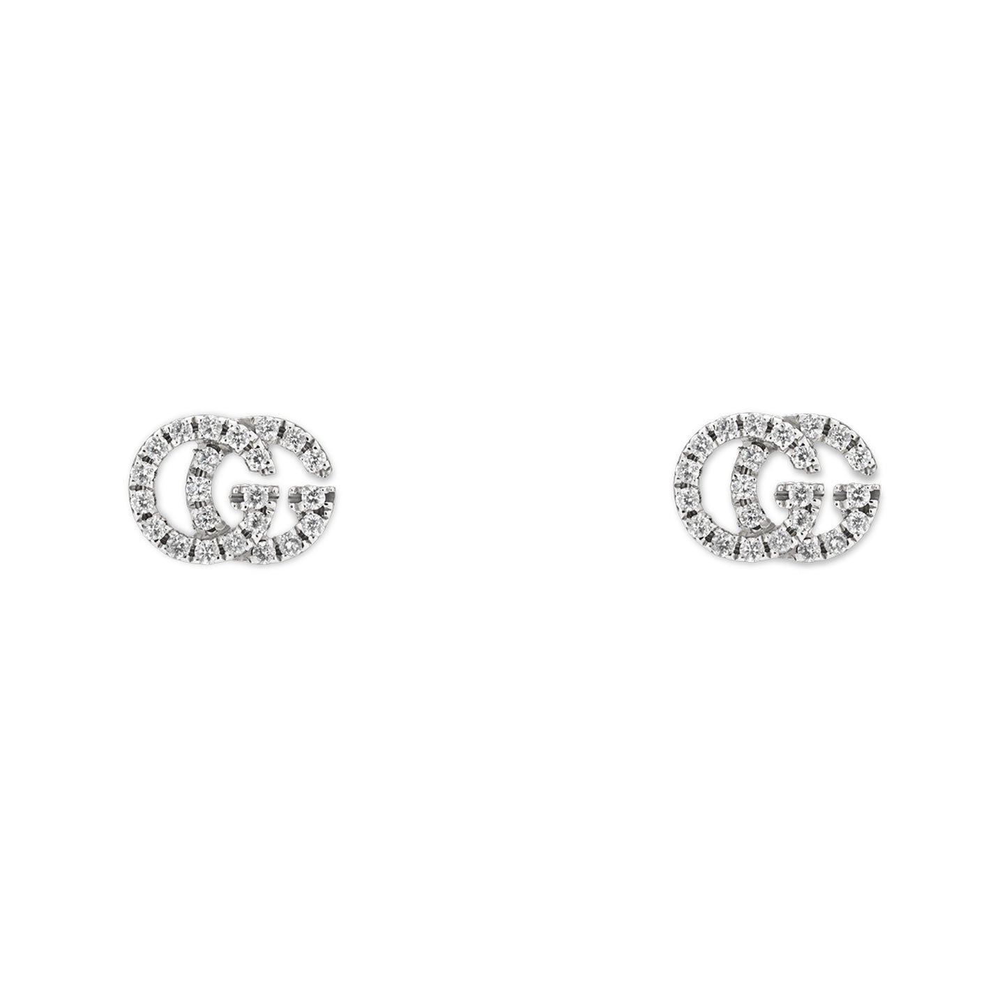Presenting the Gucci GG Running 18K White Gold Diamond Stud Earrings by GUCCI Fine Jewellery, these elegant earrings are designed in the shape of interlocking "G" letters and are adorned with small sparkling diamonds, beautifully showcased against a plain white background.