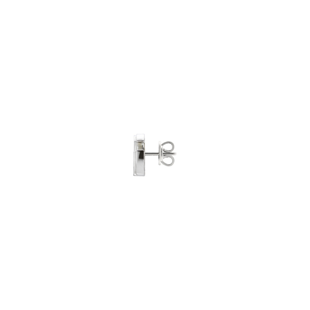A single Gucci GG Mormont sterling silver stud earring from GUCCI Fine Jewellery, featuring a circular post and butterfly back, viewed from the side against a white background.