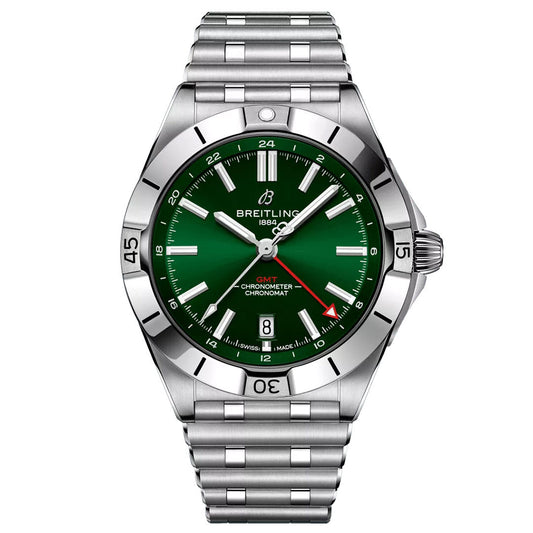 A BREITLING Chronomat Automatic GMT 40 watch by Breitling in silver, adorned with a polished metal strap and a green dial. This timepiece features dual time zone functionality, white hour markers, a date window, and red accents on the GMT hand. The bezel is designed with numeral indicators at intervals.