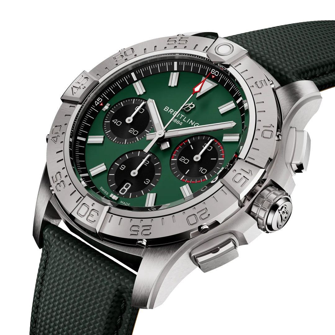 The BREITLING Avenger B01 Chronograph 42 is a luxury aviation-style wristwatch featuring a green dial with three subdials, silver stainless steel case, green military leather strap, tachymeter bezel, silver hands and hour markers, and a red-tipped seconds hand for precision.