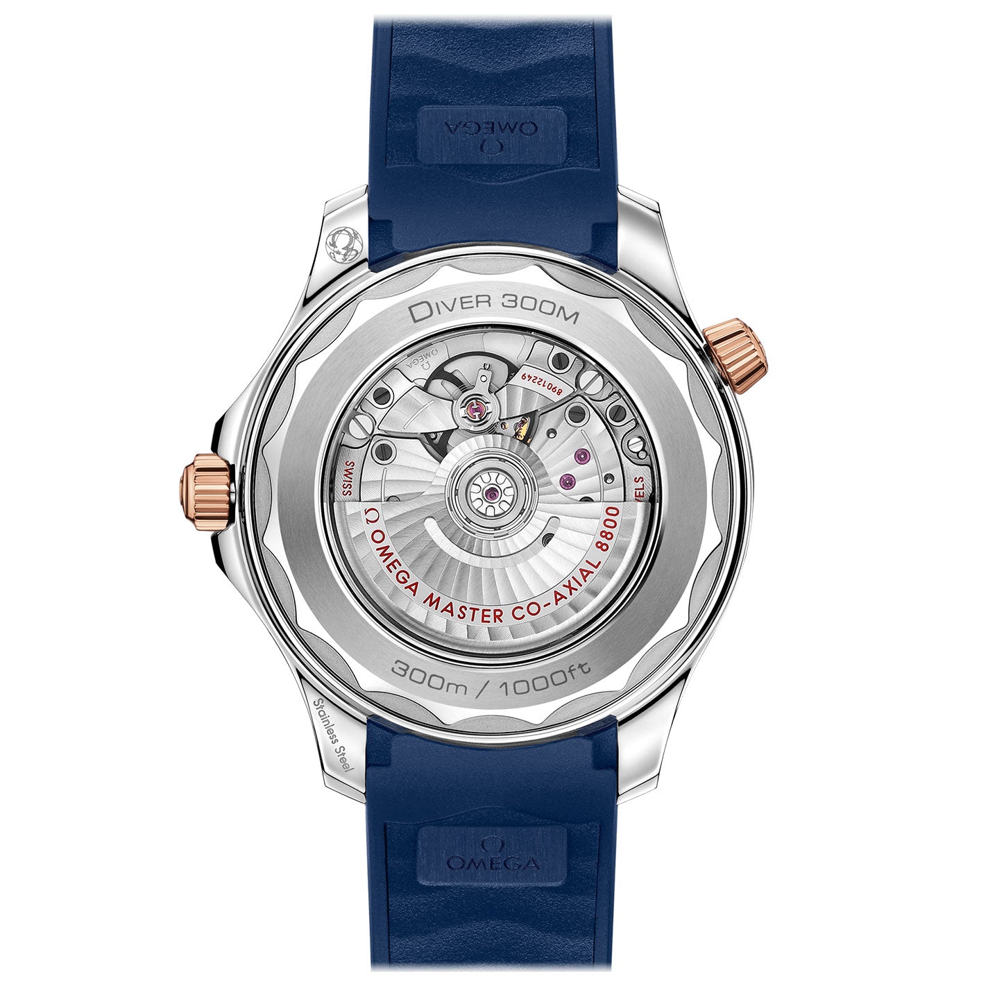 The image showcases the intricate inner mechanics of the OMEGA Seamaster Diver 300M Co-Axial Master Chronometer 42mm Watch, which features a luxurious blue strap. The case is crafted from metallic 18K Sedna™ gold and includes a rose-gold crown, along with "Diver 300M" and "300m / 1000ft.