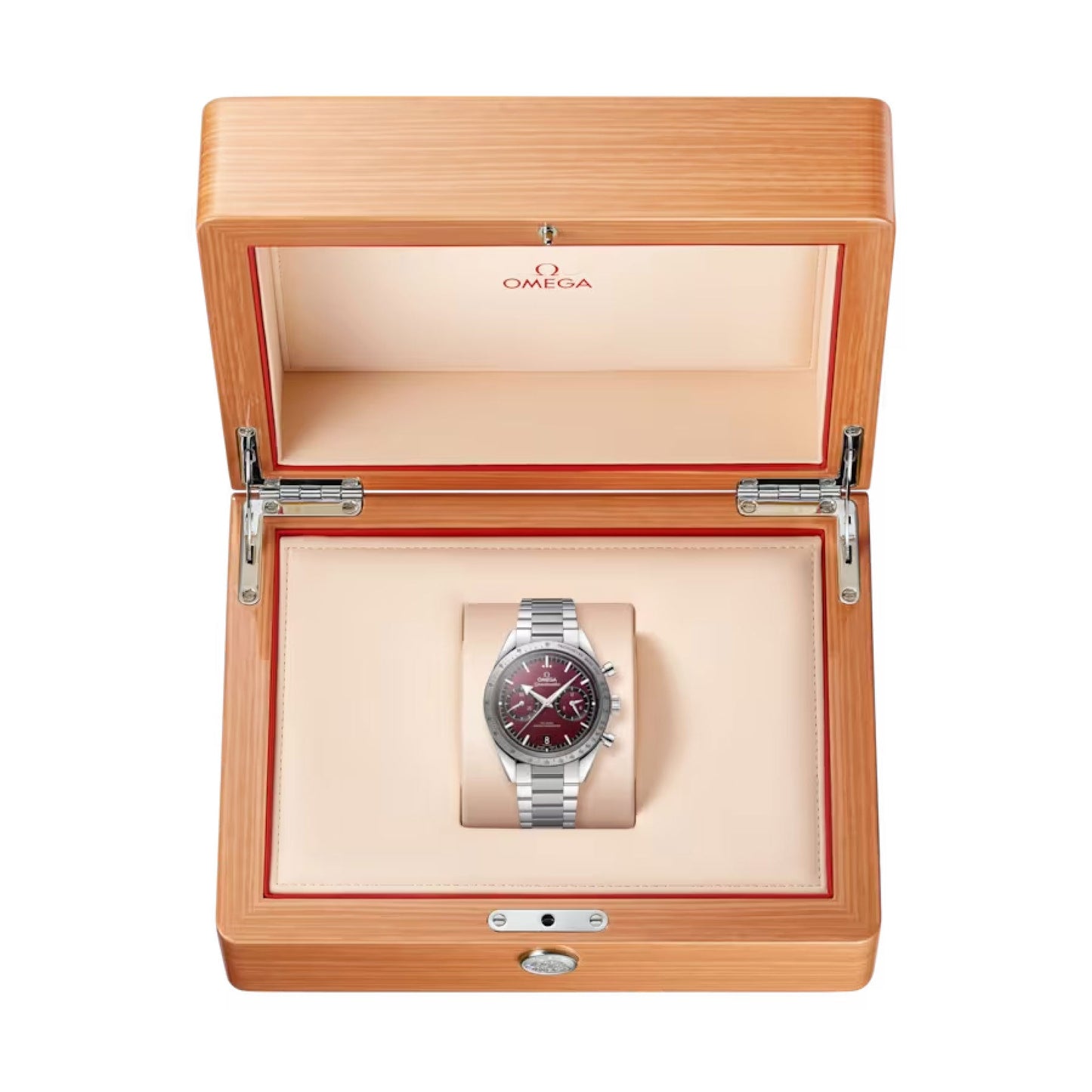 Presented in an elegant wooden box with a cream-colored interior, this luxury wristwatch boasts a red dial and silver bracelet. The lid, adorned with the iconic OMEGA logo, proudly showcases the OMEGA Speedmaster 57 Co-Axial Master Chronometer Chronograph 40.5mm Watch—a perfect blend of style and precision.