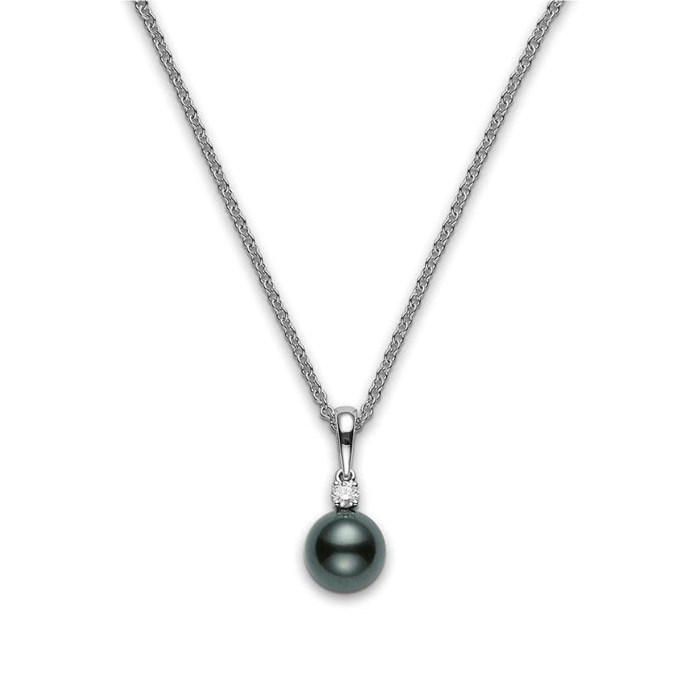 Introducing the Mikimoto 18K White Gold Diamond with Black South Sea Pearl Necklace Pendant. This exquisite piece from Mikimoto showcases a classic design, featuring a single Black South Sea pearl elegantly suspended from a sparkling crystal. Its delicate thin chain subtly enhances the pendant’s timeless beauty.