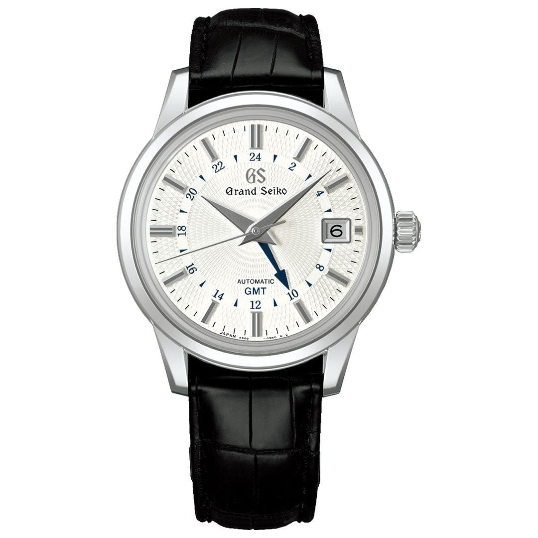 The Grand Seiko Elegance Automatic Mechanical GMT 39.5mm Watch features a Zaratsu-polished steel case, silver textured dial, black markers, date at 3 o’clock, blue GMT hand, black leather strap, and is powered by the 9S66 automatic movement.