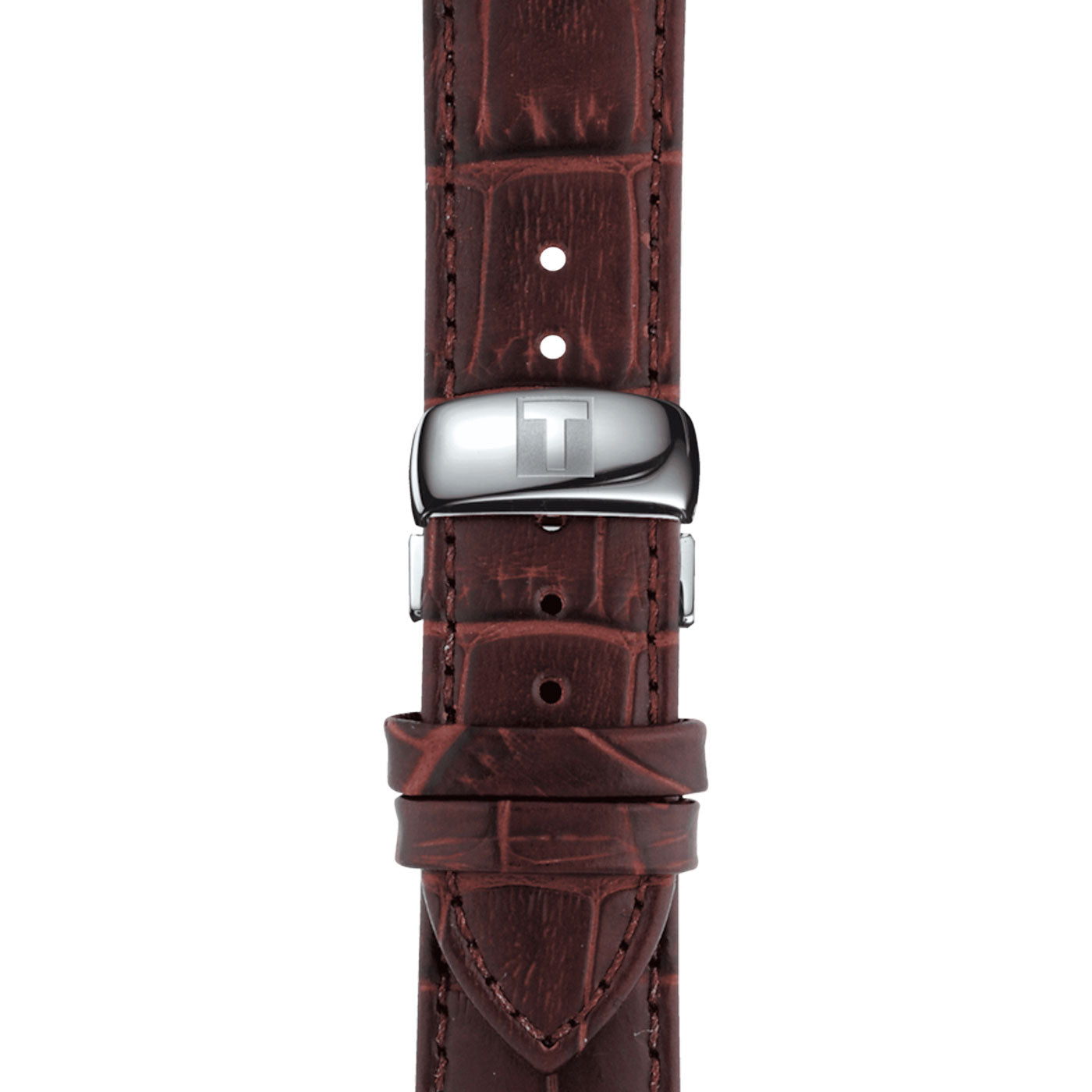 Detailed view of a brown leather strap with a silver clasp engraved with "T" from the Tissot brand. The strap, featuring a textured crocodile-like pattern and multiple adjustment holes, is paired elegantly with the stainless steel case of the Tissot Tradition Quartz 42mm Watch, showcasing timeless sophistication.