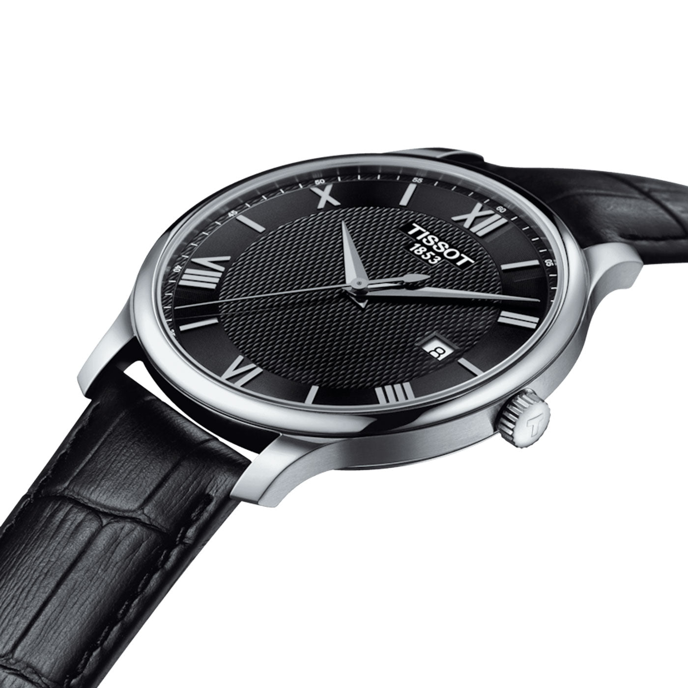The Tissot Tradition Quartz 42mm Watch by Tissot offers a sleek, vintage-style design with a black textured dial and silver Roman numerals. It boasts Swiss Quartz Movement, silver hour and minute hands, all gracefully encased in a silver metal case paired with a black leather strap.