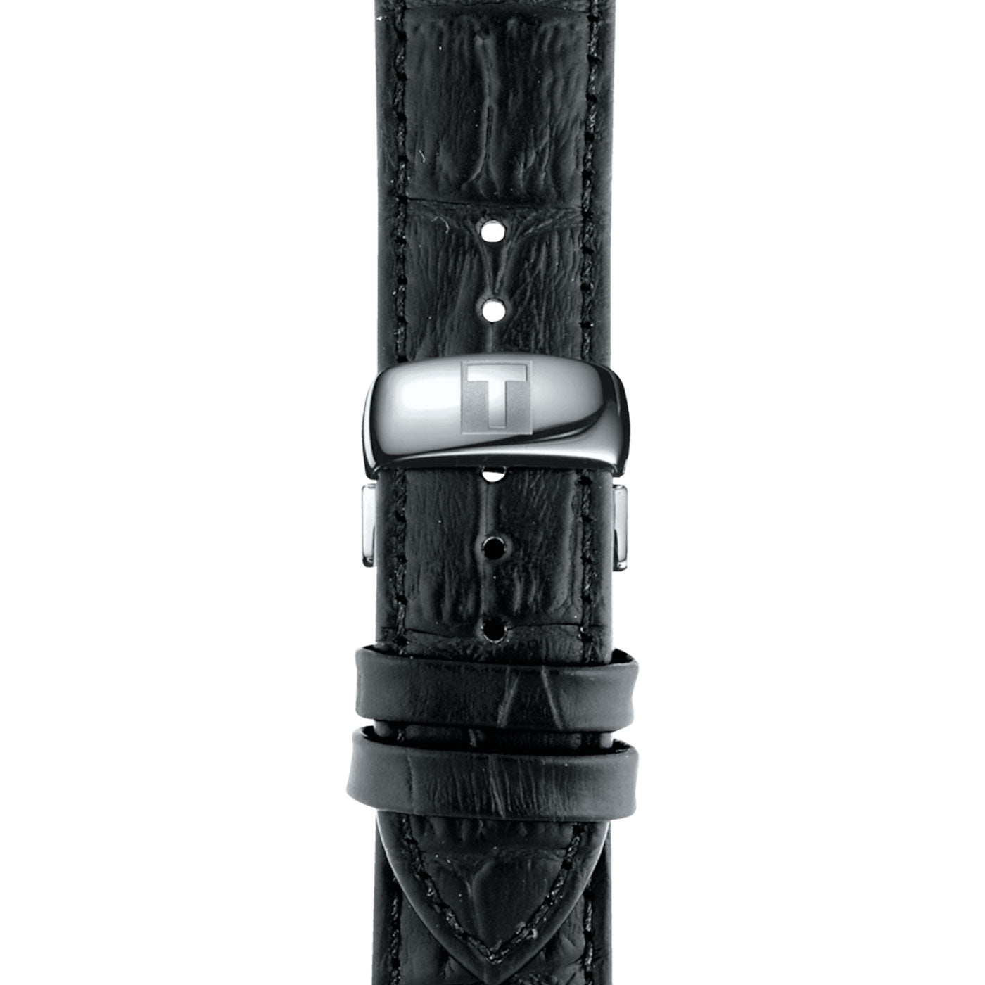 Close-up of a textured black leather watch strap with a polished metal clasp. The vintage-style design features multiple adjustment holes and two loops for securing the end, adding a touch of elegance to the Tissot Tradition Quartz 42mm Watch from Tissot's timeless collection.