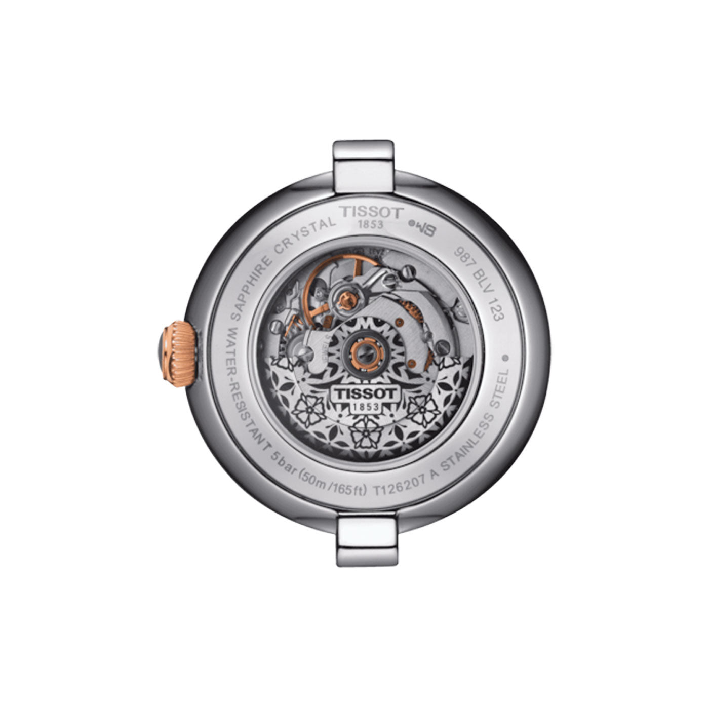 The reverse side of the Tissot Bellissima Automatic 29mm Watch reveals its Swiss Automatic Movement and exposes a mechanical wonder. The stainless steel casing encases visible gears and exquisite details. The case back is inscribed with "Tissot 1853" and "Water-Resistant 5 Bar," complemented by a crown finished in rose gold.