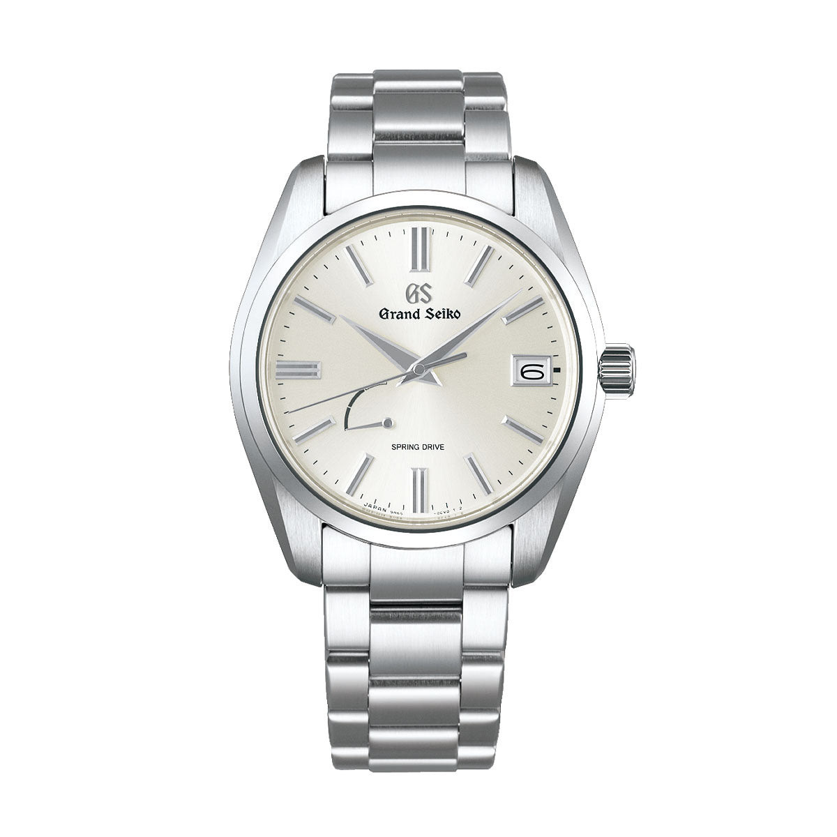 The Grand Seiko Heritage Collection Spring Drive 40mm Watch features a sleek dial adorned with silver hour markers and a date window positioned at 3 o'clock. The "Spring Drive" inscription is gracefully placed above the 6 o'clock mark. Complemented by a stainless steel strap, this watch embodies classic sophistication.