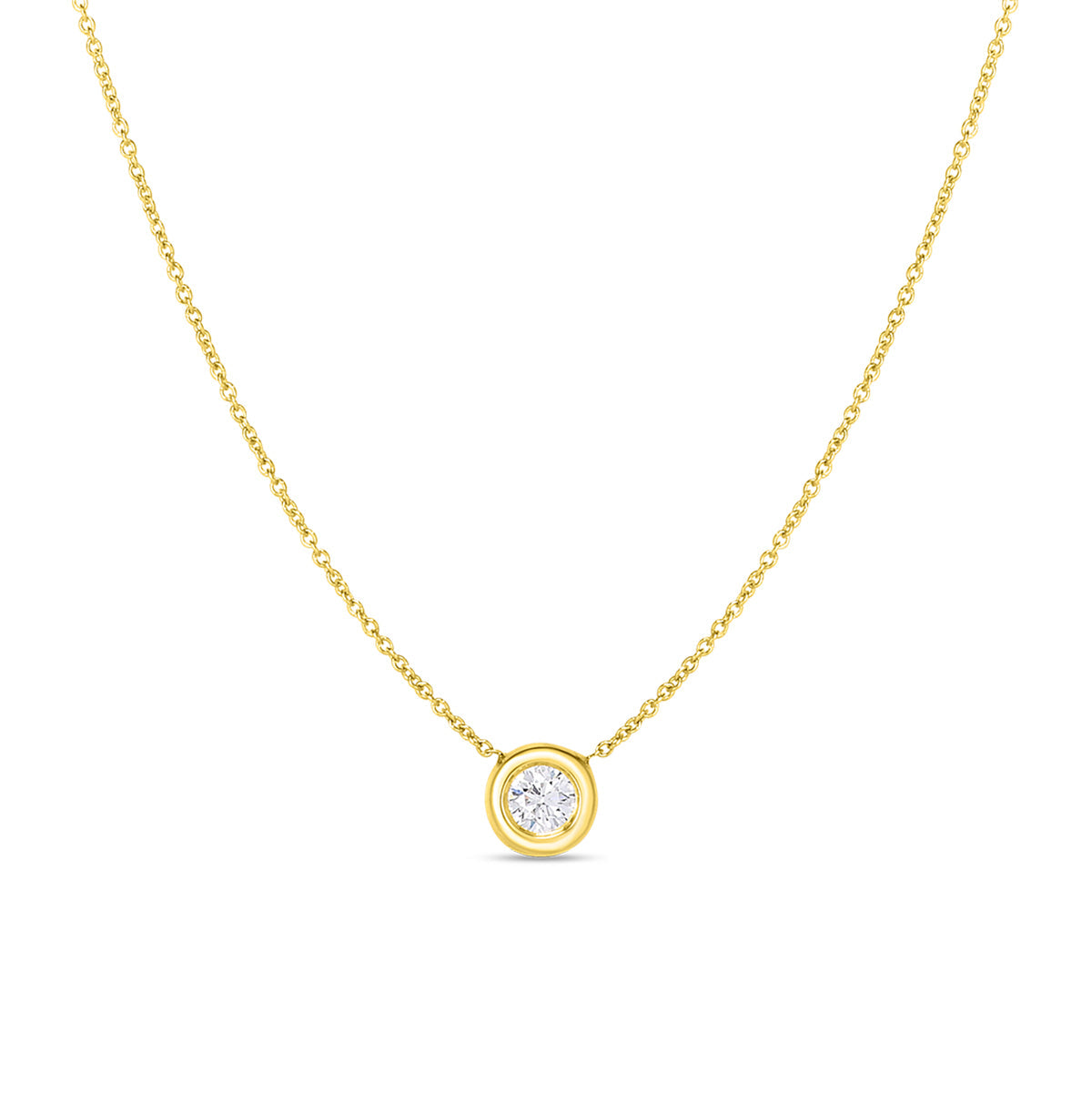 The Roberto Coin 18K Yellow Gold Bezel Set Diamond Necklace showcases a stunning round diamond secured in a smooth gold bezel setting. Its exquisite craftsmanship and minimalistic design provide an elegant and timeless appeal, making it ideal for both casual and formal wear.