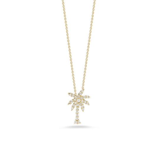 The Roberto Coin Tiny Treasures 18K White Gold Diamond Palm Tree Necklace Pendant exudes elegance and charm. Crafted by Roberto Coin, this exquisite piece features a palm tree pendant adorned with sparkling diamonds on its leaves and trunk, beautifully suspended from a delicate chain. Displayed against a plain white background, it showcases the perfect blend of sophistication and allure.