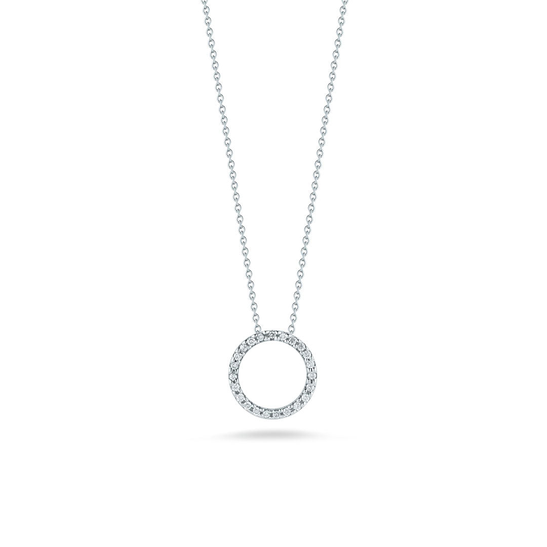 The Roberto Coin Tiny Treasures 18K White Gold Small Diamond Circle Necklace Pendant features a delicate circular pendant adorned with sparkling diamonds, shown on a plain white background.