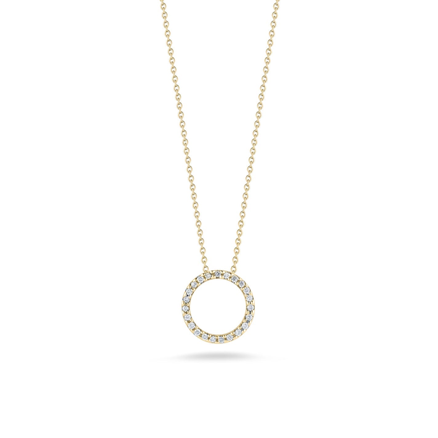 The Roberto Coin Tiny Treasures 18K Yellow Gold Diamond Circle Necklace Pendant, crafted by Roberto Coin, showcases a dazzling circular diamond pendant adorned with small diamonds. Suspended gracefully from a delicate chain, the open-centered design sparkles beautifully against a plain white background.