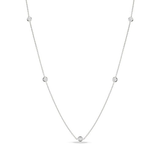 Introducing the Roberto Coin Diamonds By The Inch 18K White Gold Five Station Necklace, a beautifully crafted piece featuring a delicate thin chain adorned with evenly spaced round stones that resemble diamonds.