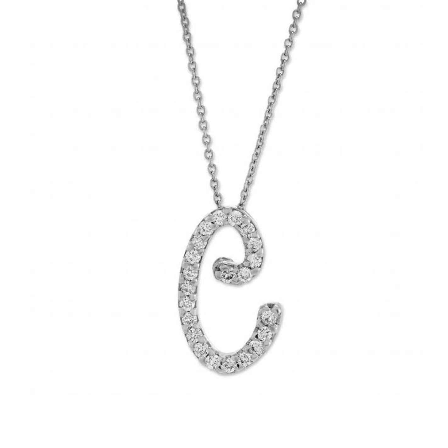 Presented against a simple white background, the Roberto Coin Tiny Treasures necklace showcases an 18K White Gold pendant in the form of a letter "C," adorned with shimmering jewels. This exquisite piece reflects the elegance of the Diamond Cursive Initial design by Roberto Coin.